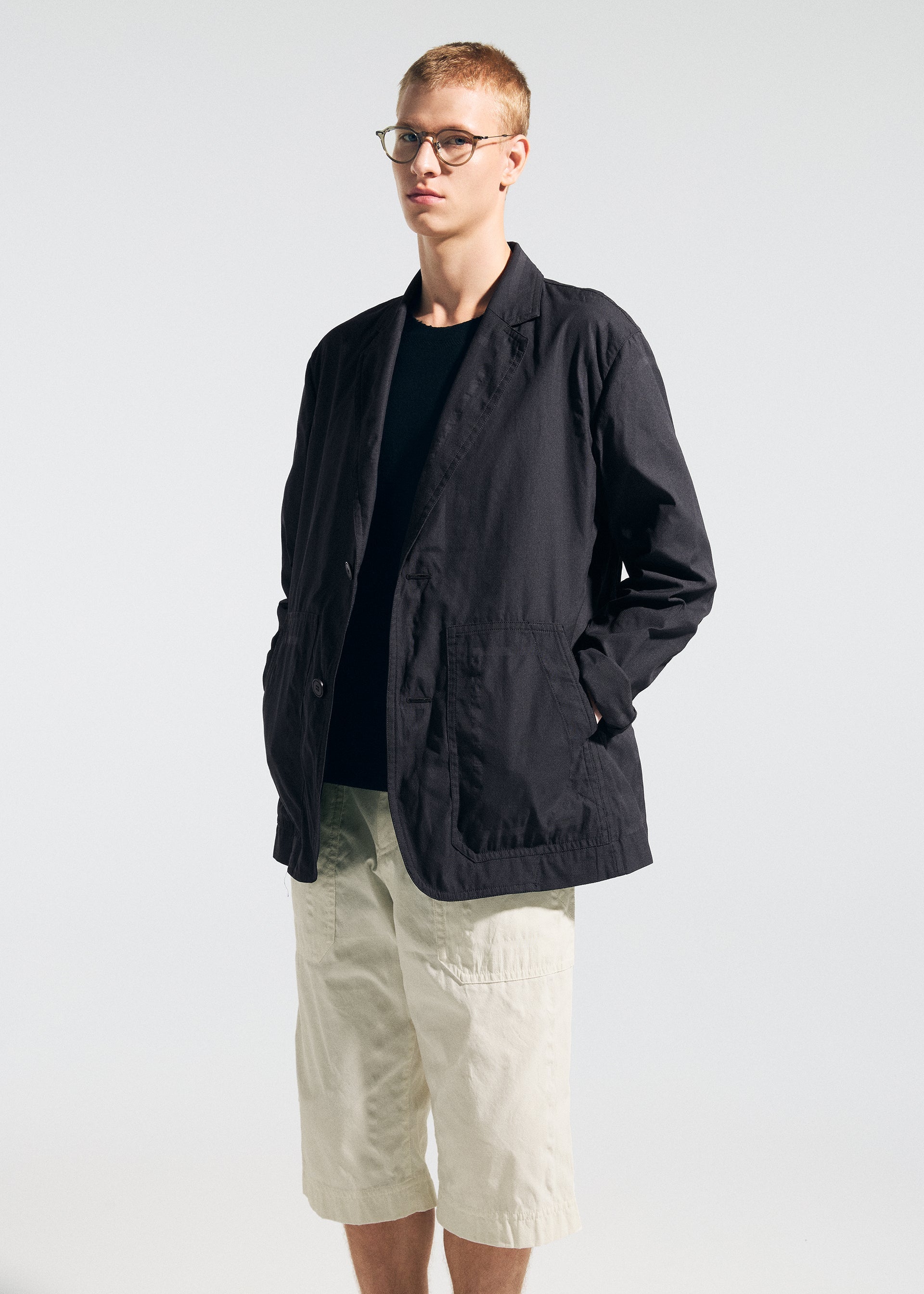 A model wears the A-POC ABLE ISSEY MIYAKE TYPE-U 001 type-u-001-shorts-black.