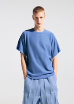 A model wears the A-POC ABLE ISSEY MIYAKE TYPE W 009 1 trousers.