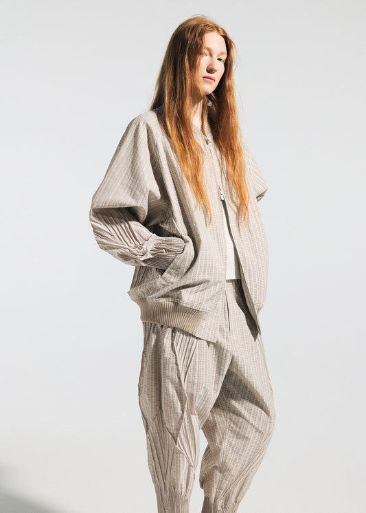 A model wears the A-POC ABLE ISSEY MIYAKE TYPE S 001 1 trousers.
