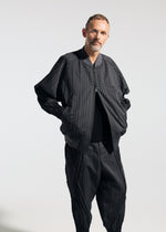 A model wears the A-POC ABLE ISSEY MIYAKE TYPE S 001 1 trousers.