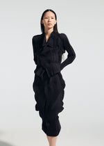 A model wears the A-POC ABLE ISSEY MIYAKE TYPE-O 022 type-o-022-skirt-black.