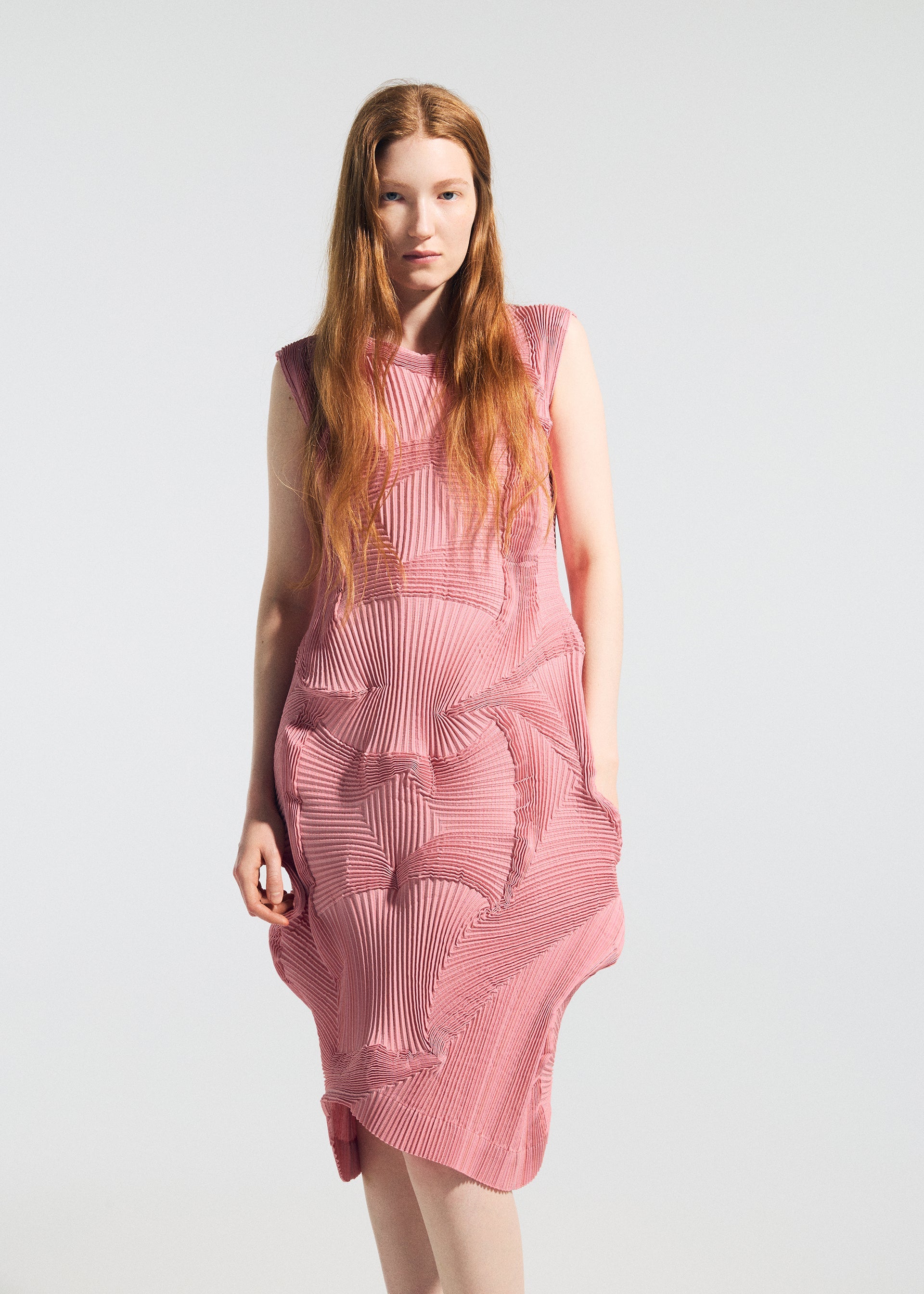 A model wears the A-POC ABLE ISSEY MIYAKE TYPE O 003 dress.