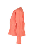 A detail shot of the A-POC ABLE ISSEY MIYAKE TYPE W 009 1 cardigan.