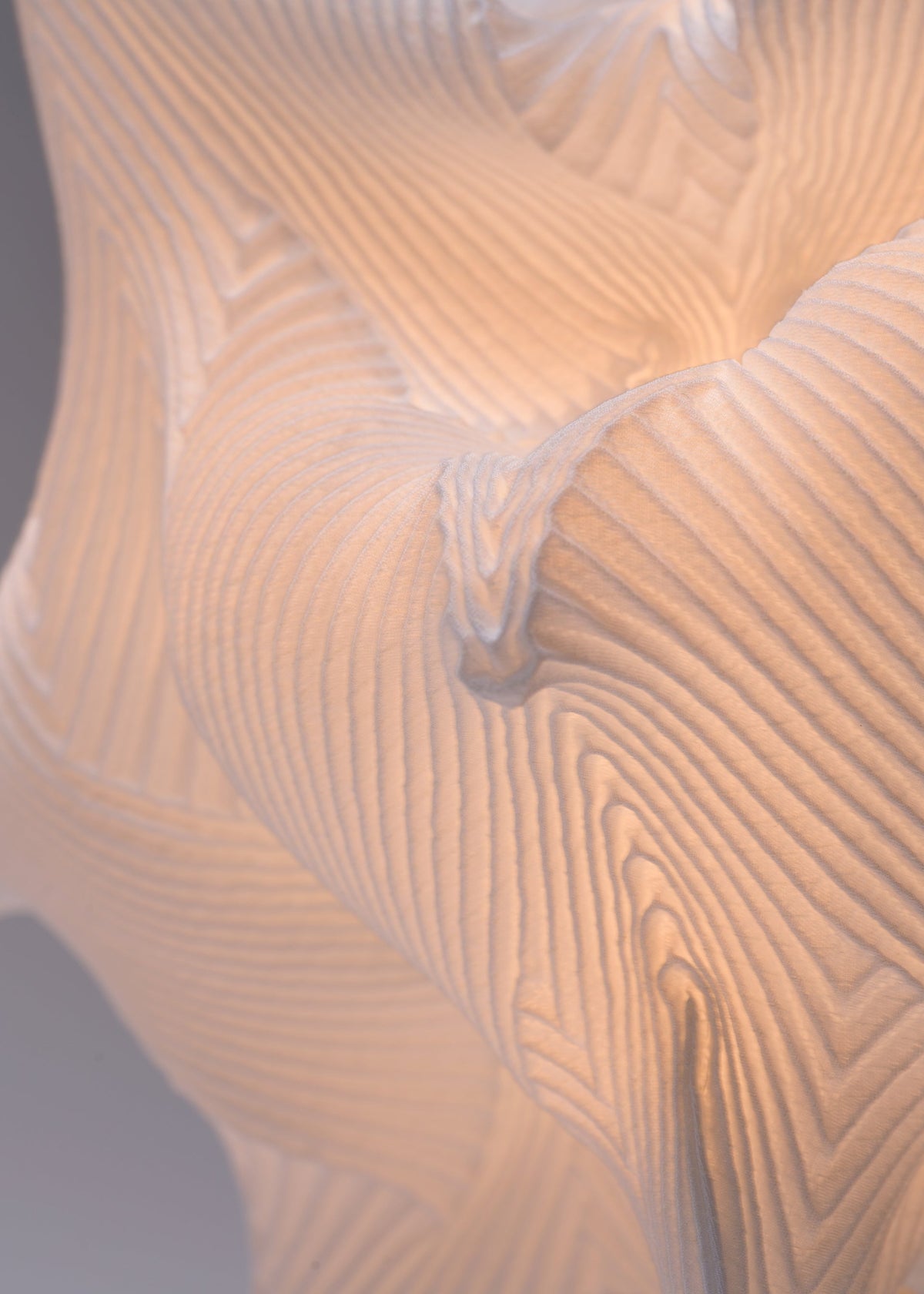 A detail shot of the A-POC ABLE ISSEY MIYAKE TYPE XIII Atelier Oï project lamp.