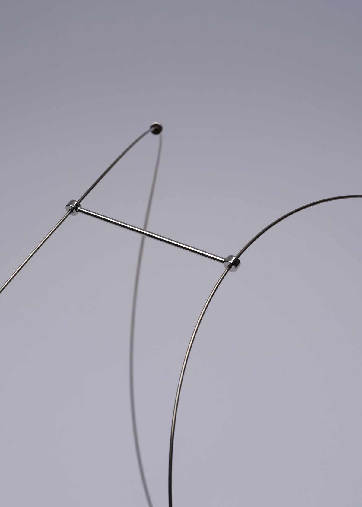 A detail shot of the A-POC ABLE ISSEY MIYAKE TYPE XIII Atelier Oï project lamp.
