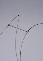 A detail shot of the A-POC ABLE ISSEY MIYAKE TYPE XIII Atelier Oï project lamp.