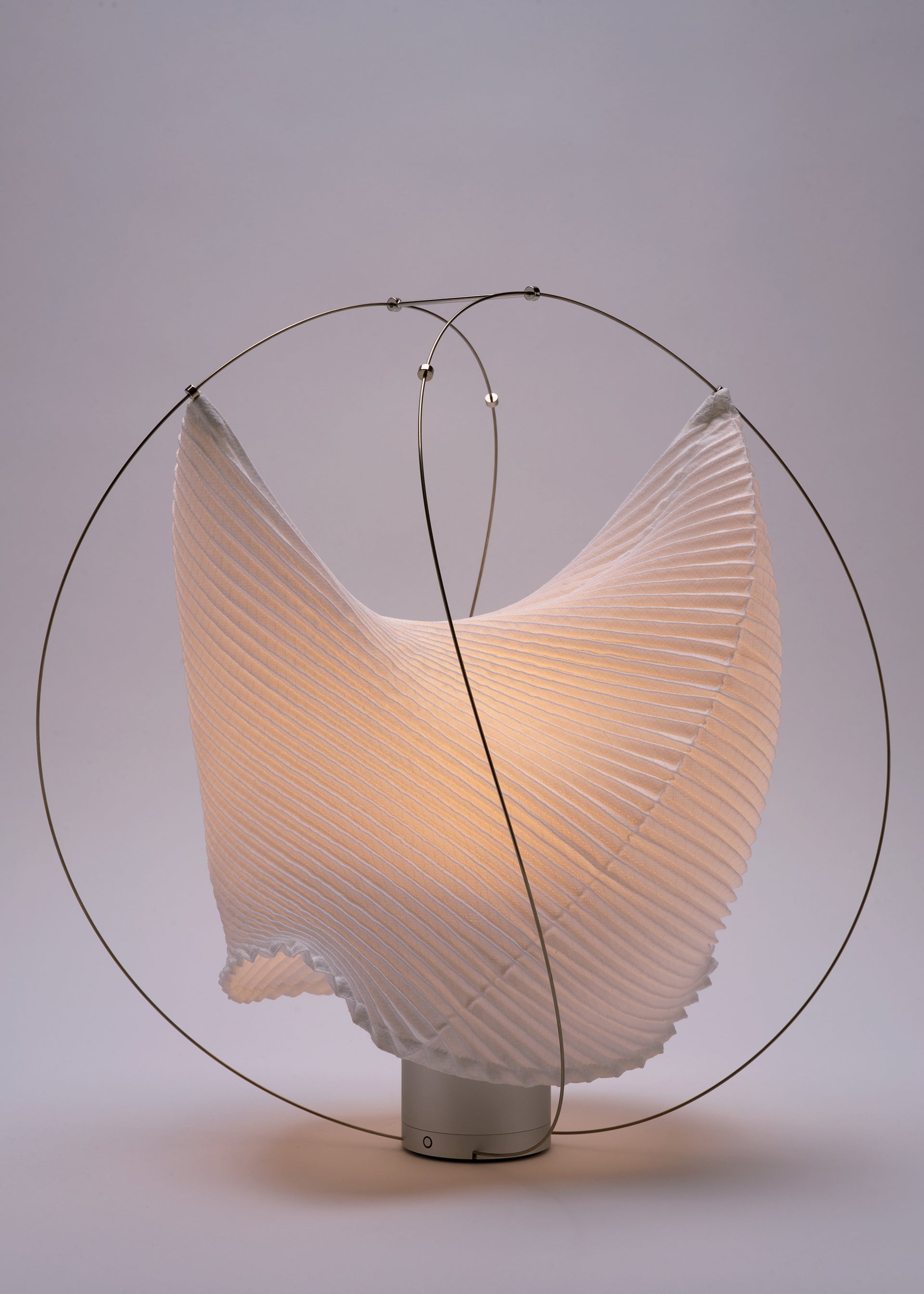 A detail shot of the A-POC ABLE ISSEY MIYAKE TYPE XIII Atelier Oï project lamp.