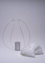 A detail shot of the A-POC ABLE ISSEY MIYAKE TYPE XIII Atelier Oï project lamp.