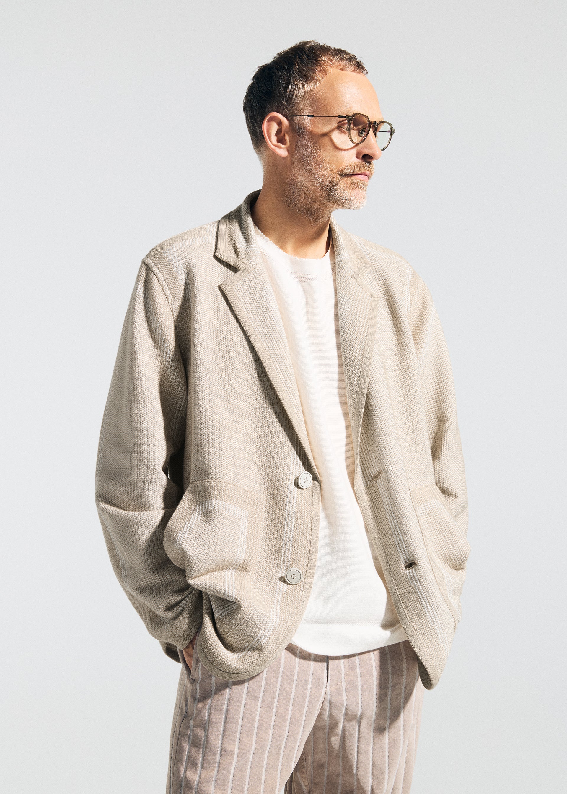 A model wears the A-POC ABLE ISSEY MIYAKE TYPE K 008 jacket.