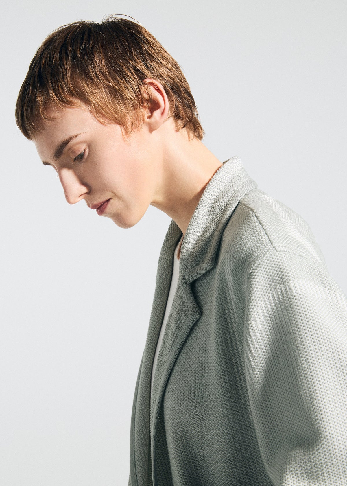 A model wears the A-POC ABLE ISSEY MIYAKE TYPE K 008 jacket.
