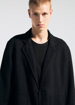 A model wears the A-POC ABLE ISSEY MIYAKE TYPE K 008 jacket.
