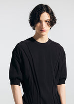 A model wears the A-POC ABLE ISSEY MIYAKE TYPE K 003 1 shirt.