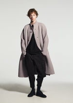 A model wears the A-POC ABLE ISSEY MIYAKE TYPE-O 024 type-o-024-coat-red.