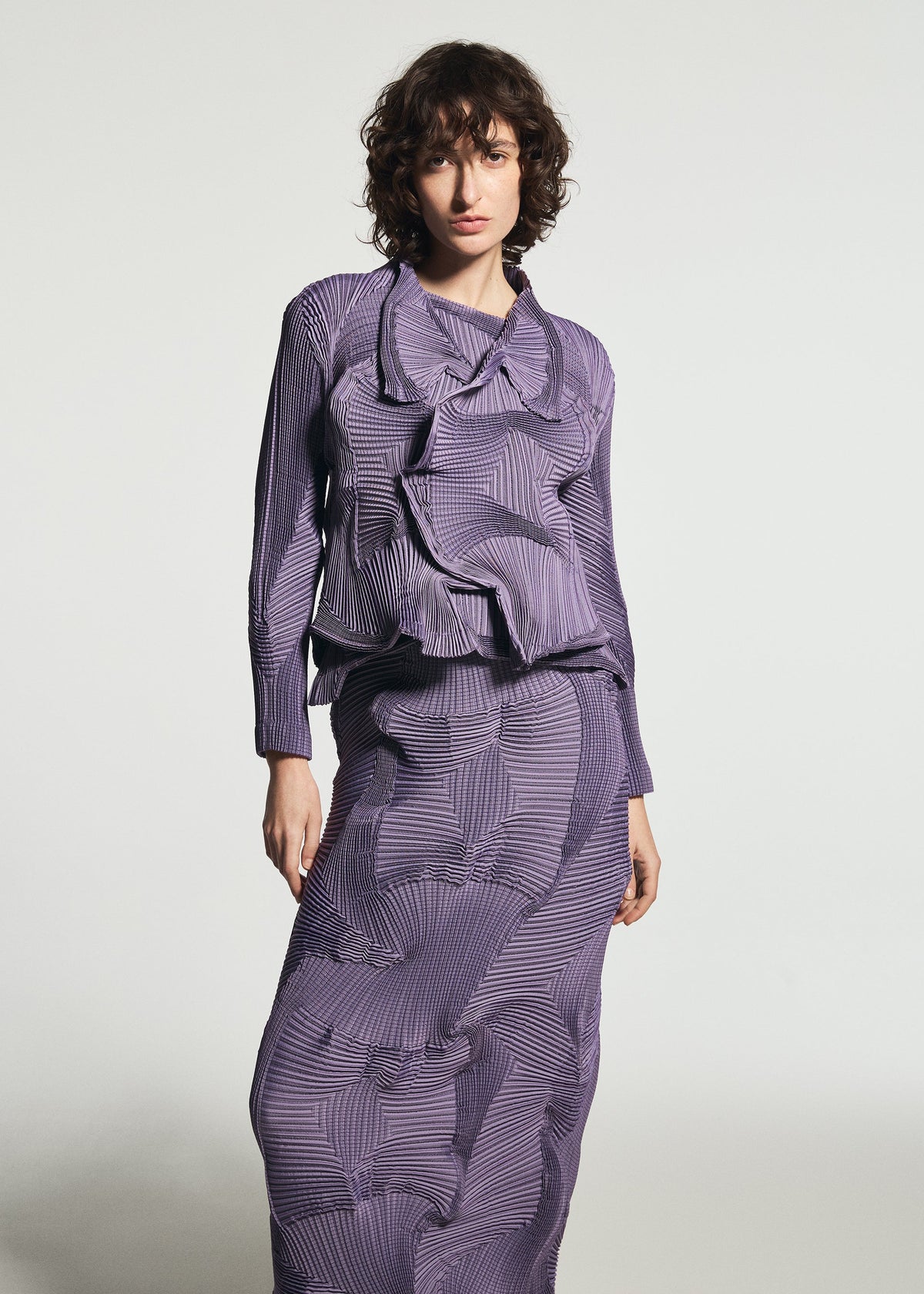 A model wears the A-POC ABLE ISSEY MIYAKE TYPE-O 003-1 type-o-003-1-skirt-turquoise-green-1.