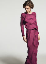 A model wears the A-POC ABLE ISSEY MIYAKE TYPE-O 003-1 type-o-003-1-skirt-turquoise-green-1.