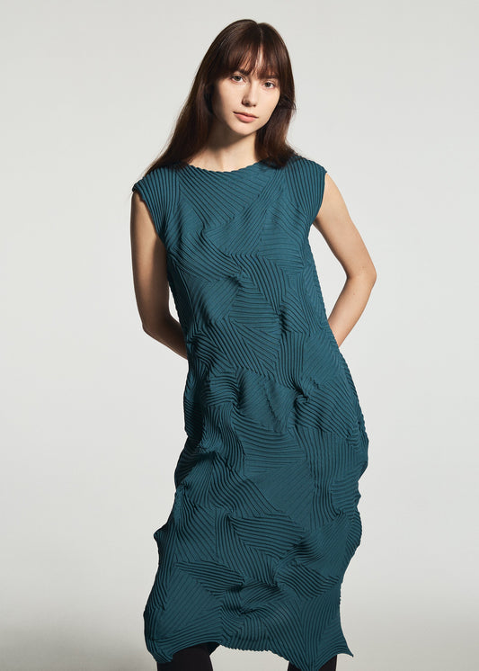 A model wears the A-POC ABLE ISSEY MIYAKE TYPE-P 003-1 type-p-003-1-dress-navy.