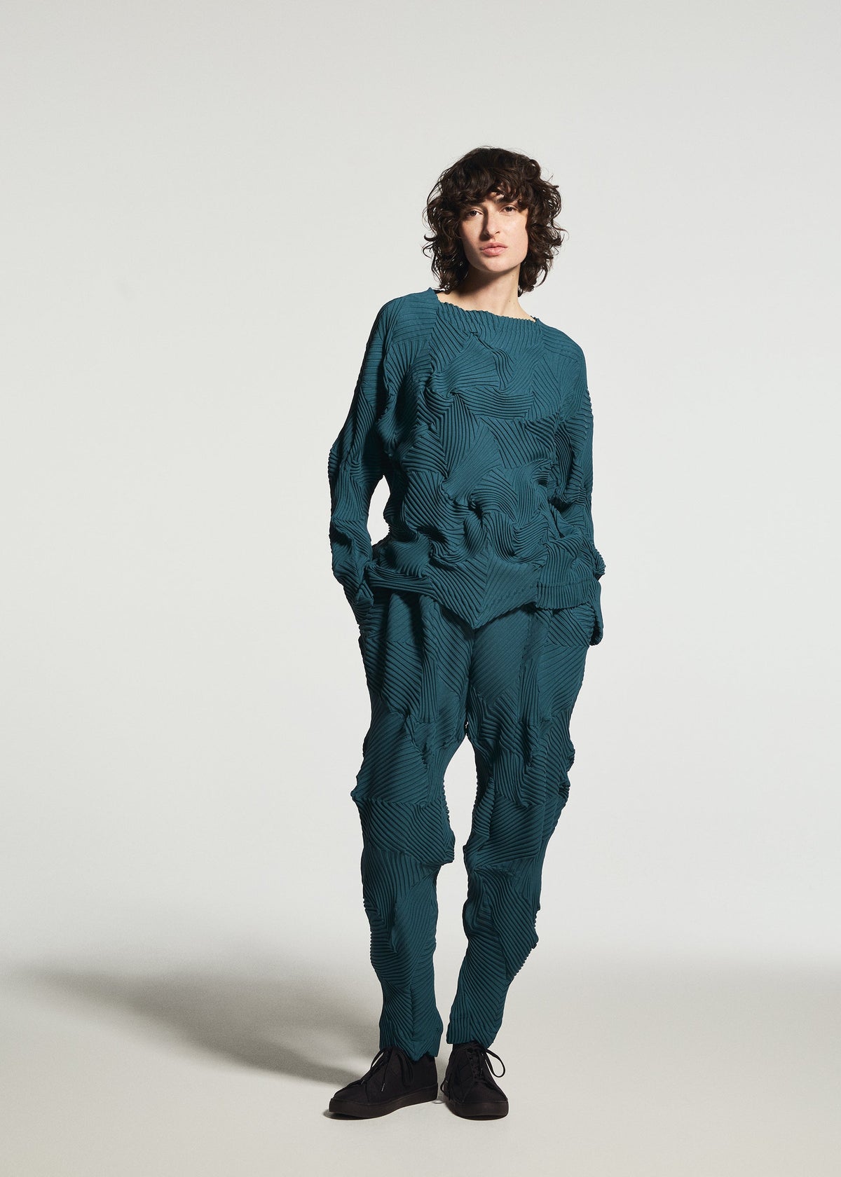 A model wears the A-POC ABLE ISSEY MIYAKE TYPE-P 003-1 type-p-003-1-top-turquoise-green.