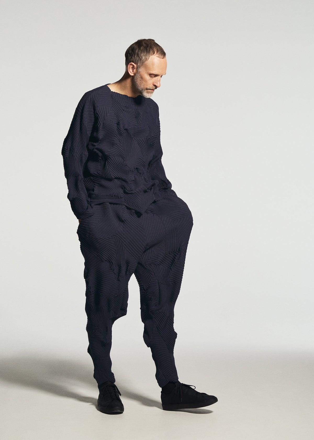 A model wears the A-POC ABLE ISSEY MIYAKE TYPE-P 003-1 type-p-003-1-top-turquoise-green.