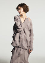 A model wears the A-POC ABLE ISSEY MIYAKE TYPE-O 010-1 type-o-010-1-cardigan-khaki.