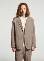 A model wears the A-POC ABLE ISSEY MIYAKE TYPE-K 012 type-k-012-jacket-black-hued.