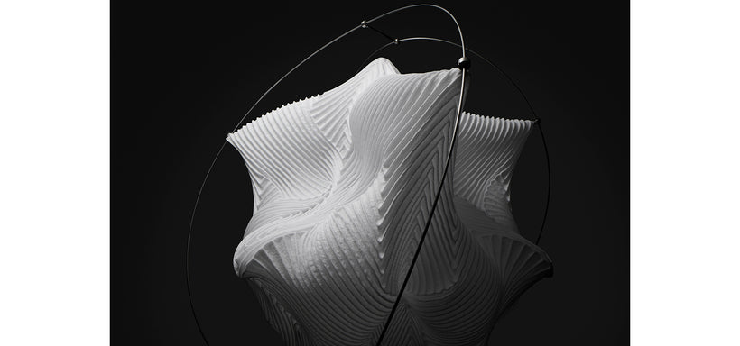 Centre: TYPE-XIII Atelier Oï project Lamp in White, against black background.