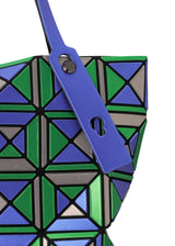 A detail shot of the BAO BAO ISSEY MIYAKE ENSEMBLE tote.