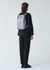 A model wears the BAO BAO ISSEY MIYAKE TRACK backpack.