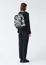 A model wears the BAO BAO ISSEY MIYAKE  DAYPACK SPRITZ backpack