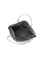 A detail shot of the BAO BAO ISSEY MIYAKE BATEAU MATTE hand bag.