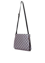 A detail shot of the BAO BAO ISSEY MIYAKE ROW METALLIC shoulder bag.