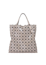 A product shot of the BAO BAO ISSEY MIYAKE PRISM METALLIC tote in greige (46).