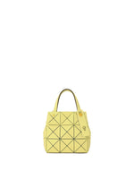 A product shot of the BAO BAO ISSEY MIYAKE CARAT hand bag in yellow (52).