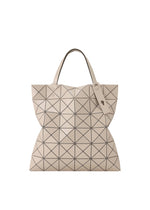 A product shot of the BAO BAO ISSEY MIYAKE LUCENT ONE TONE tote in sand beige (47).