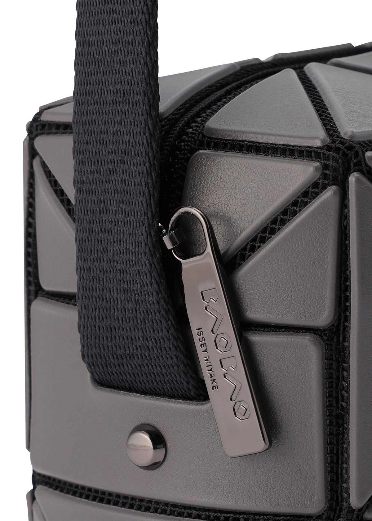 A detail shot of the BAO BAO ISSEY MIYAKE CUBOID shoulder bag.