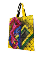 A detail shot of the BAO BAO ISSEY MIYAKE MANGA tote.