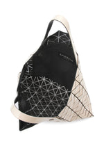 A detail shot of the BAO BAO ISSEY MIYAKE PRISM tote.