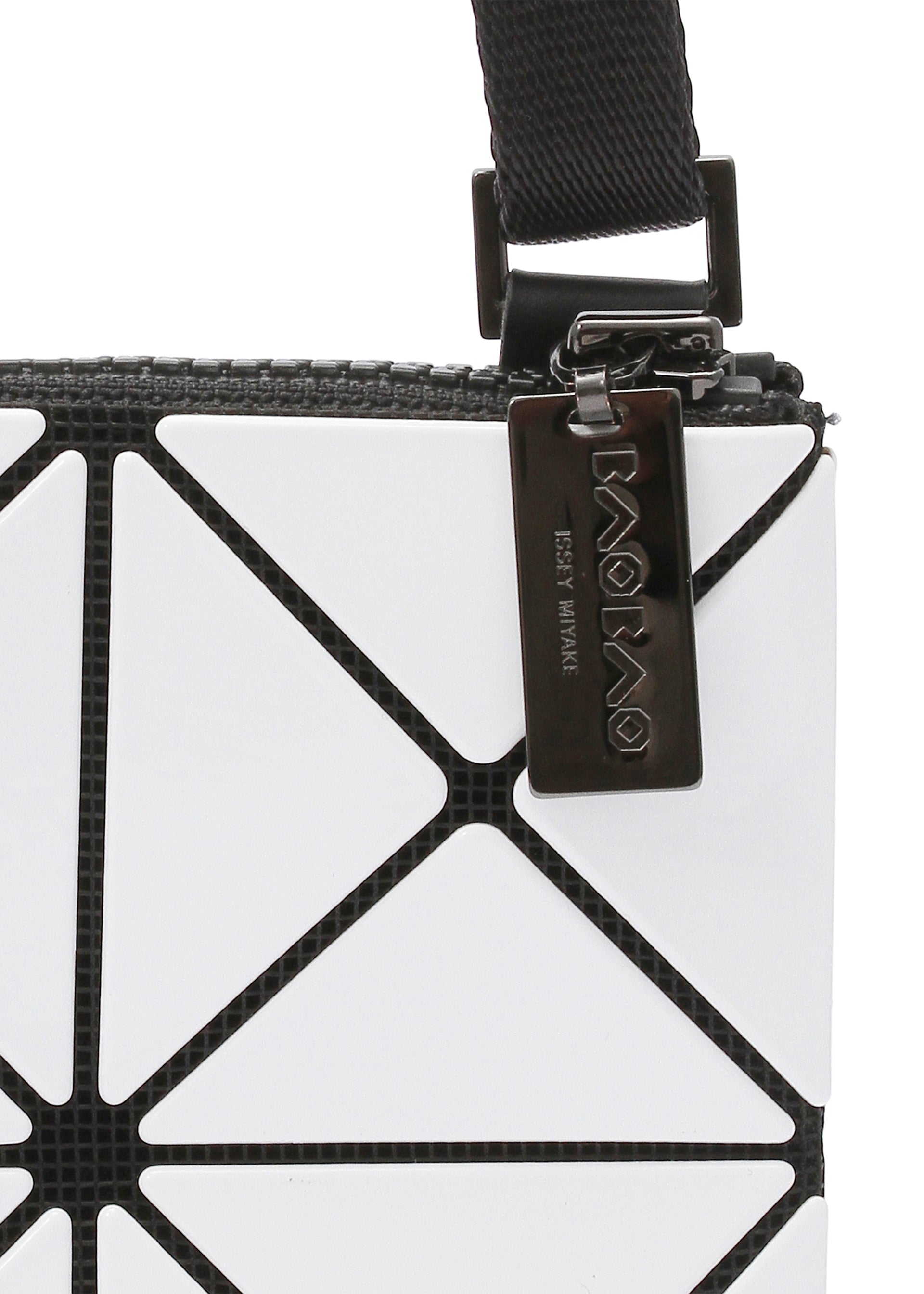A detail shot of the BAO BAO ISSEY MIYAKE LUCENT crossbody.
