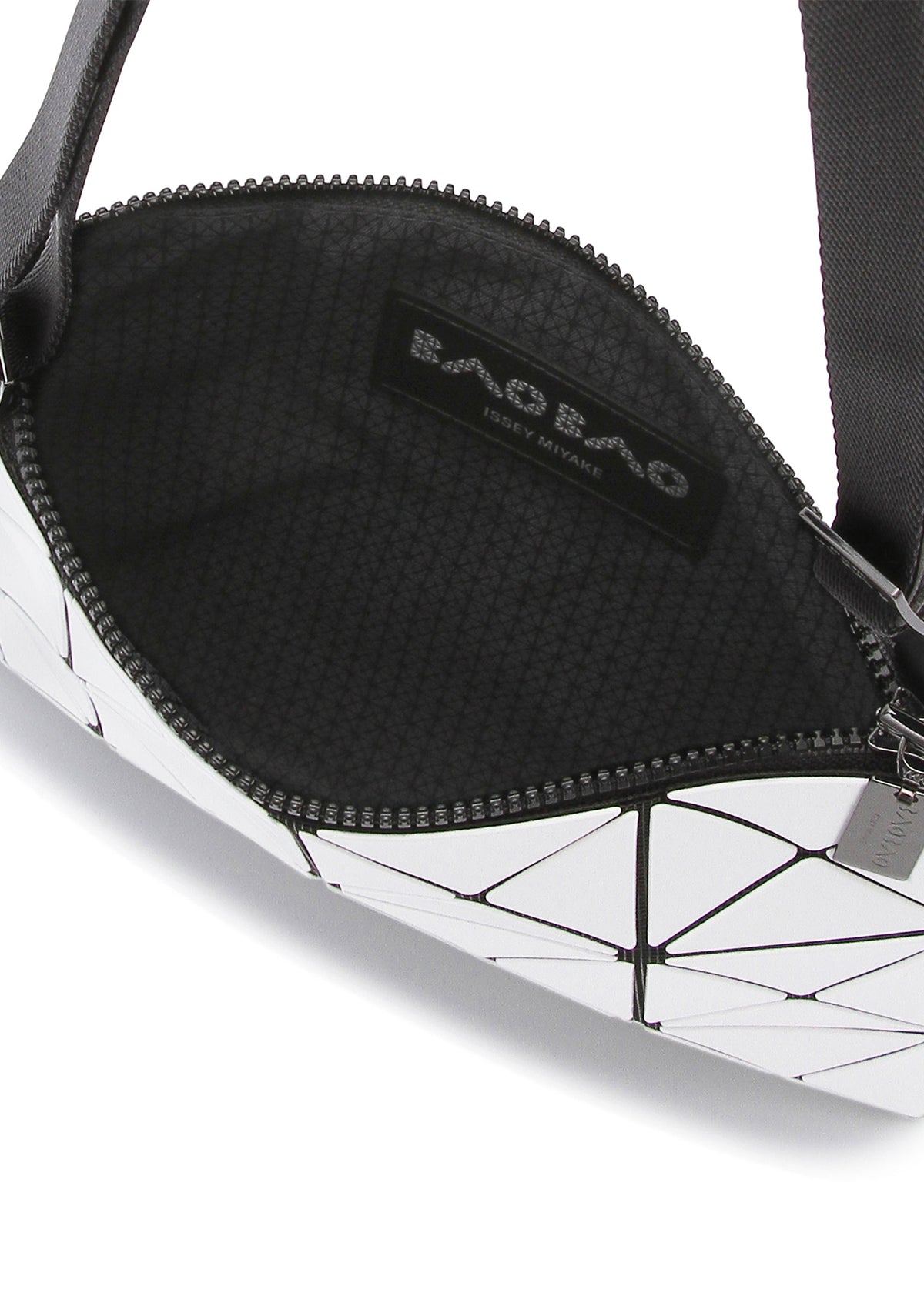A detail shot of the BAO BAO ISSEY MIYAKE LUCENT crossbody.