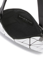 A detail shot of the BAO BAO ISSEY MIYAKE LUCENT crossbody.
