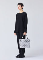 A model wears the BAO BAO ISSEY MIYAKE ROCK MATTE 0.