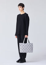 A model wears the BAO BAO ISSEY MIYAKE ROCK MATTE 0.