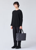 A model wears the BAO BAO ISSEY MIYAKE ROCK MATTE 0.