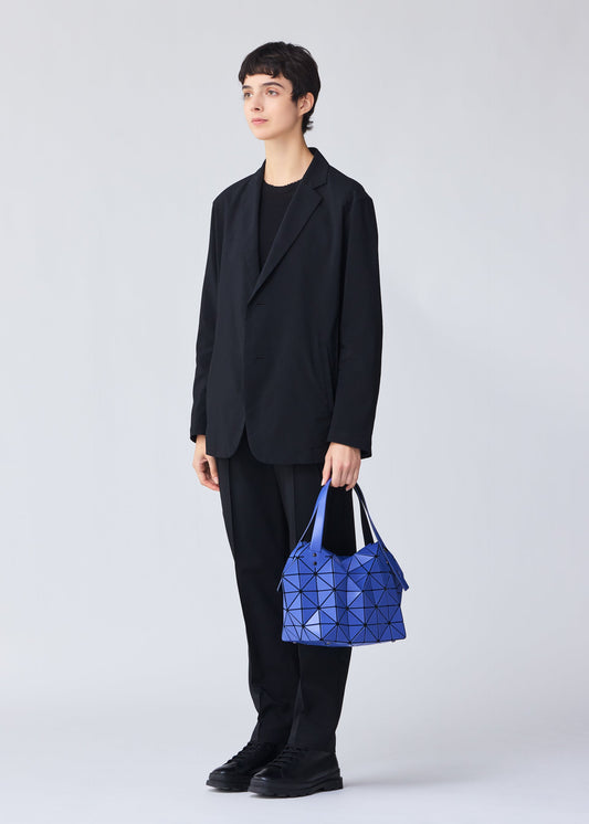 A model wears the BAO BAO ISSEY MIYAKE BOSTON 0.