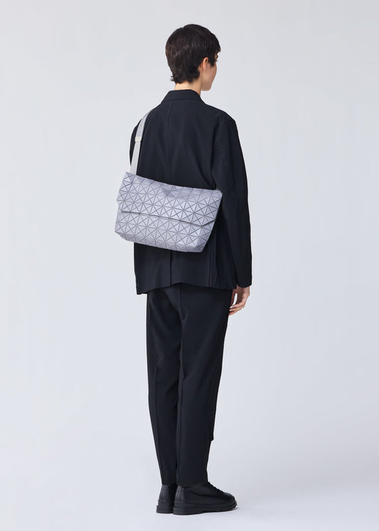 A model wears the BAO BAO ISSEY MIYAKE PRISM SAC shoulder bag.