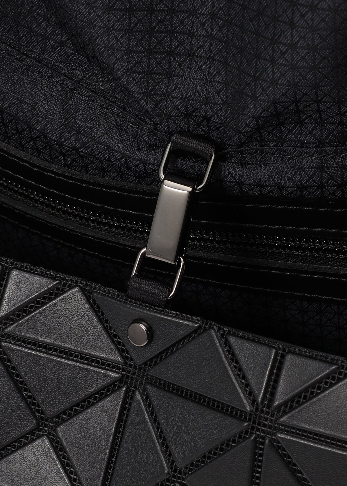 A detail shot of the BAO BAO ISSEY MIYAKE PRISM SAC shoulder bag.