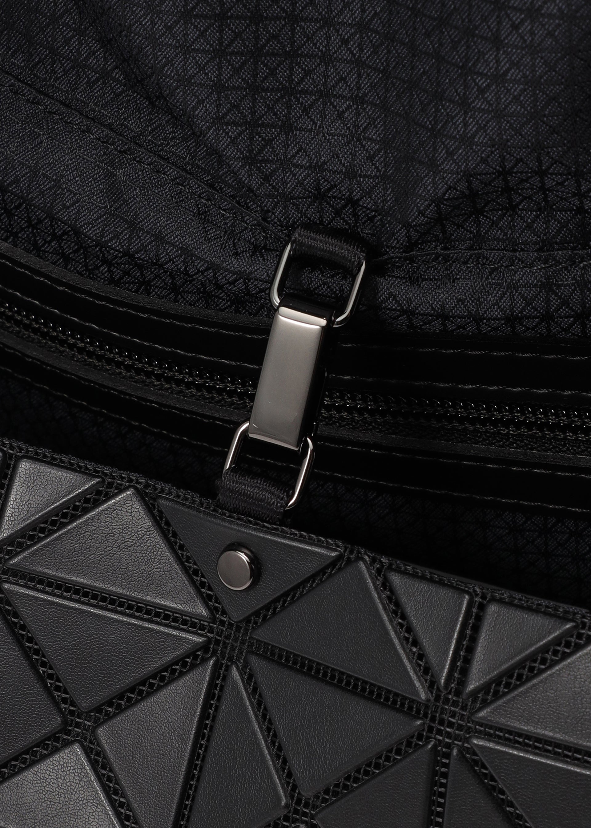 A detail shot of the BAO BAO ISSEY MIYAKE PRISM SAC shoulder bag.