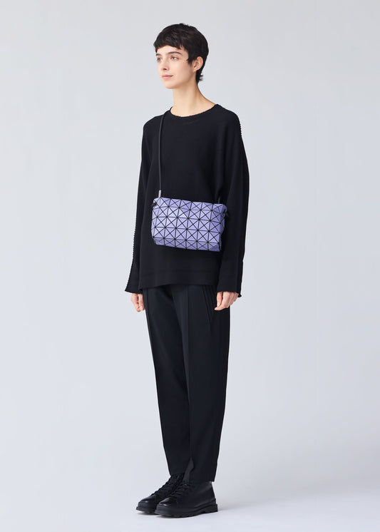 A model wears the BAO BAO ISSEY MIYAKE LOOP MATTE shoulder bag.