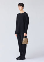 A model wears the BAO BAO ISSEY MIYAKE CARAT 0.
