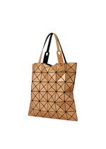 A detail shot of the BAO BAO ISSEY MIYAKE LUCENT METALLIC tote.