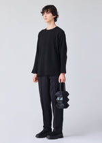 A model wears the BAO BAO ISSEY MIYAKE MEOW 0.